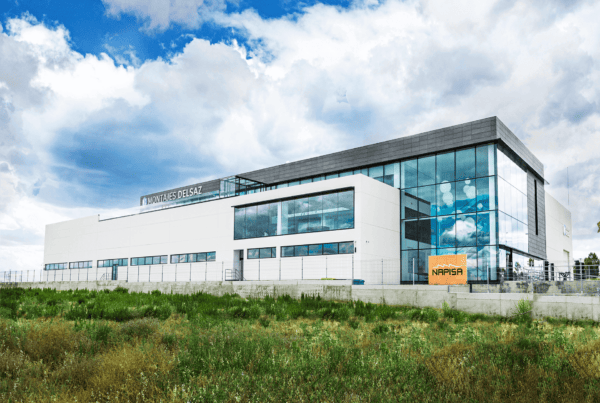 The new industrial building of Montajes Delsaz, located in Calle Siete Picos 5, Alcobendas (Madrid), has obtained the LEED Certification (Leadership in Energy & Environmental Design) Silver Level. The strategy followed for the construction of this building has been based on the three basic pillars of sustainability: Economy, Environment and Social Welfare. The project has been built under the following sustainability criteria One of the most distinguished features of the project regarding energy efficiency and demand is the percentage of savings. The building energy simulation has reached the value of 51% of energy use and cost savings. The main reasons to obtain this percent are: A vegetated roof choice to decrease the building energy demand. High reflectance site materials to reduce heat island effect. Solar water heating facility implementation. Photovoltaic panels facilities implementation. The cold-heat production systems are carried out using efficient systems. Also, other important aspects related to the sustainability of the building are the parking spaces for low emitting/ fuel efficient vehicles. The implementation of efficient water supply fixtures, such as high efficiency toilets (2-4 liters), urinals (1 lpf) and showerheads (4 lpm) led to a 48,95% potable water savings. Concerning materials and resources, 30 products with an Environmental Product Declaration were used. The project includes products from 12 different manufacturers. The health and comfort of the occupants has been addressed by installing a 100% outdoor air Air Handling Units and achieving an additional outdoor air supply of 30%. In addition, CO2 probes have been installed in spaces with high occupation. Also, interior lighting is properly distributed ensuring comfortable lighting levels in the workplace. To this end, the following measures have been adopted in the different sections of the building: light points with 3 lighting levels and the implementation of dimmers. The LEED certification process was supported by Minsait, a consultancy firm specialized in sustainable building. Minsait, an Indra company, is a leading digital transformation and Information Technology consulting company in Spain and Latin America. Minsait has a high degree of specialization and sectorial knowledge, which it complements with its high capacity to integrate the core world with the digital world, its leadership in innovation and digital transformation and its flexibility. With this, it focuses its offerings on high-impact value propositions, based on end-to-end solutions, with a remarkable segmentation, allowing it to achieve tangible impacts for its customers in each industry under a transformational approach. Its capacities and leadership are shown in its product offer, under the name Onesait, and its transversal offer of services.